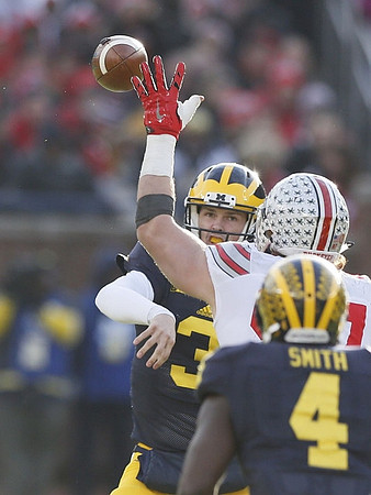 Jake Rudock (15) and De'Veon Smith (4)