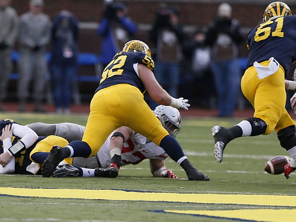 Jake Rudock (15), Mason Cole (52), and Graham Glasgow (61)