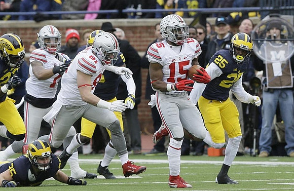 Jarrod Wilson (22), Joe Bolden (35), and Dymonte Thomas (25)