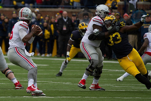 Jabrill Peppers (5) and Taco Charlton (33)