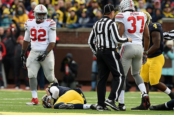 Jake Rudock (15) and De'Veon Smith (4)