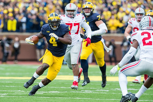 De'Veon Smith (4) and Ben Braden (71)