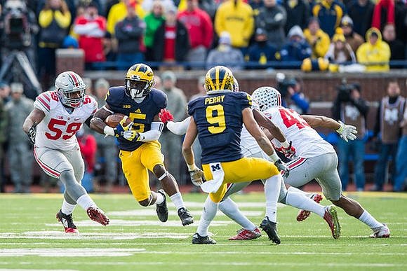 Jabrill Peppers (5) and Grant Perry (9)