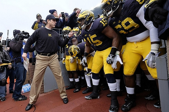 Jim Harbaugh, James Ross (15), and Willie Henry (69)