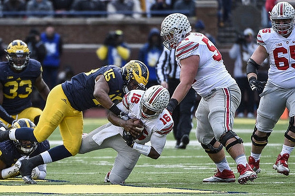 Taco Charlton (33) and James Ross (15)