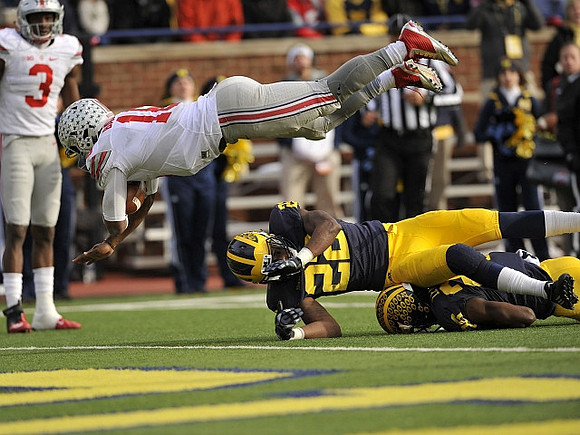 Jarrod Wilson (22) and Jourdan Lewis (26)