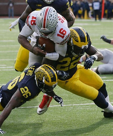 Jourdan Lewis (26), Jarrod Wilson (22), and Taco Charlton (33)