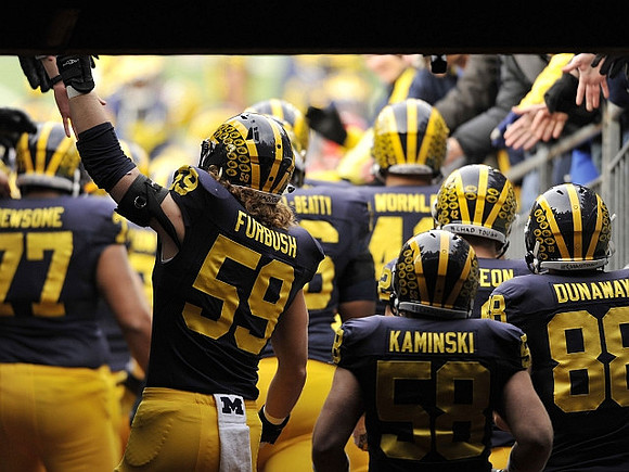 Grant Newsome (77), Noah Furbush (59), Juwann Bushell-Beatty (76), Chris Wormley (43), Alex Kaminski (58), and Jack Dunaway (88)
