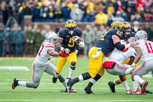 Jabrill Peppers (5) and Graham Glasgow (61)
