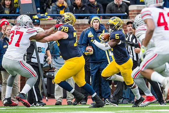 Erik Magnuson (78) and Jabrill Peppers (5)