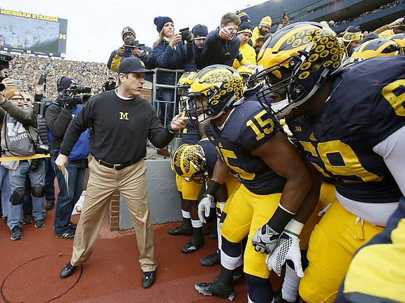 Jim Harbaugh, James Ross (15), and Willie Henry (69)
