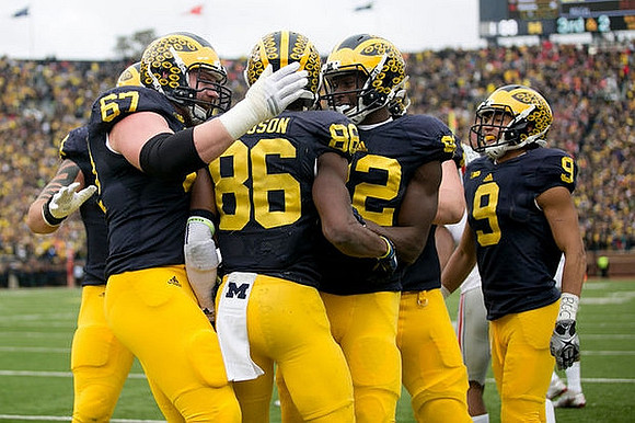 Kyle Kalis (67), Jehu Chesson (86), Amara Darboh (82), and Grant Perry (9)