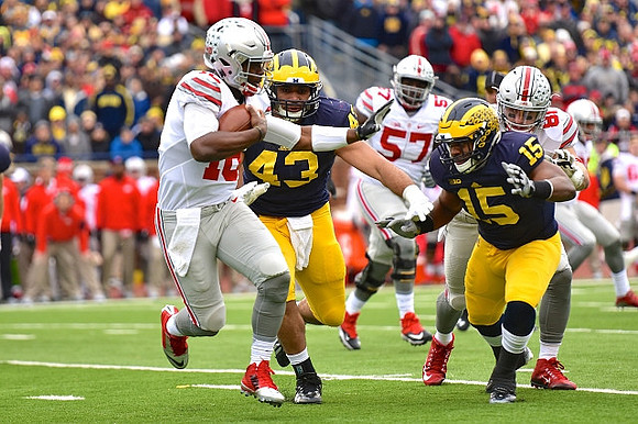 Chris Wormley (43) and James Ross (15)