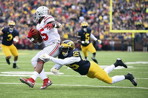 Desmond Morgan (3), Dymonte Thomas (25), and Jabrill Peppers (5)