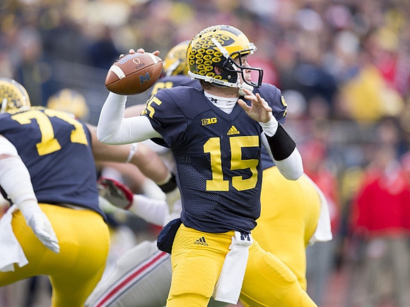Ben Braden (71) and Jake Rudock (15)