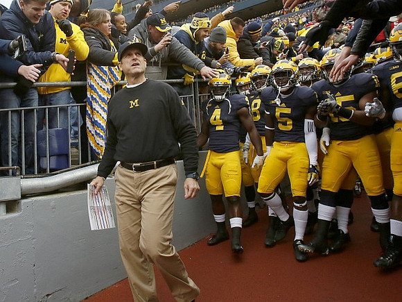 Jim Harbaugh, De'Veon Smith (4), Jabrill Peppers (5), and James Ross (15)