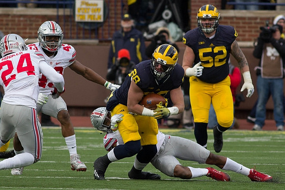 Jehu Chesson (86) and Mason Cole (52)