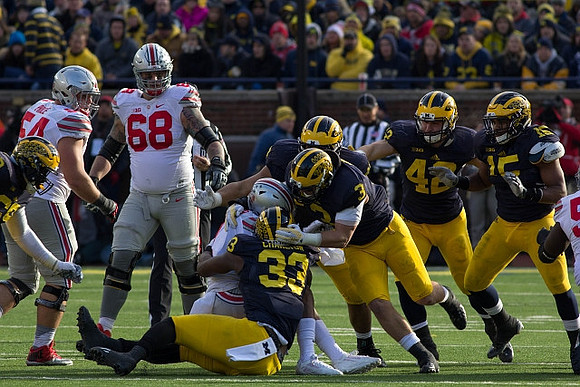Taco Charlton (33), Desmond Morgan (3), Ben Gedeon (42), and James Ross (15)