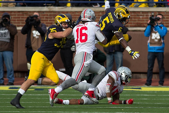Joe Bolden (35) and Jabrill Peppers (5)