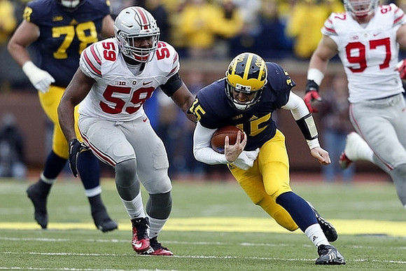 Erik Magnuson (78) and Jake Rudock (15)