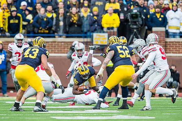 Chris Wormley (43), Jourdan Lewis (26), and Mason Cole (52)