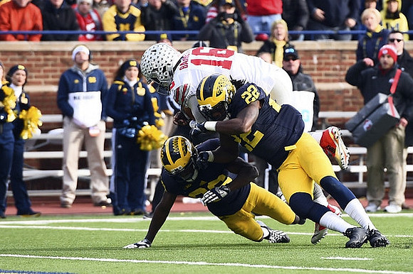 Jourdan Lewis (26) and Jarrod Wilson (22)