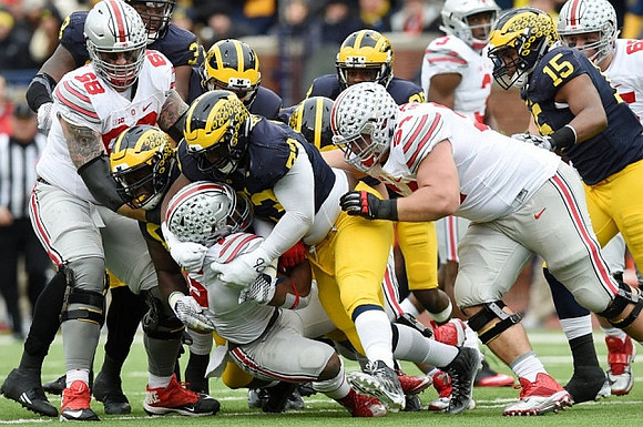 Willie Henry (69), Taco Charlton (33), and James Ross (15)