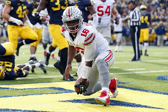 Jarrod Wilson (22), Chris Wormley (43), Taco Charlton (33), and Delano Hill (44)
