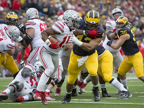 Chris Wormley (43) and Joe Bolden (35)