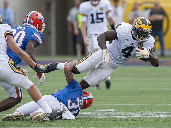 De'Veon Smith (4) and Jake Rudock (15)