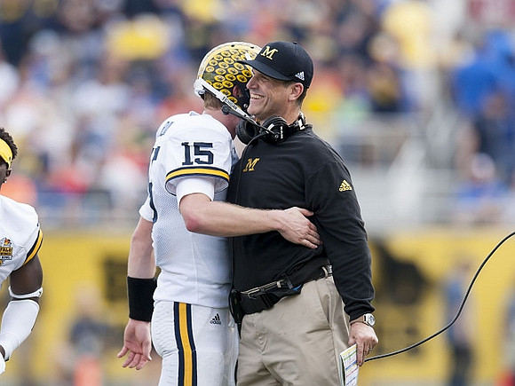 Jake Rudock (15) and Jim Harbaugh