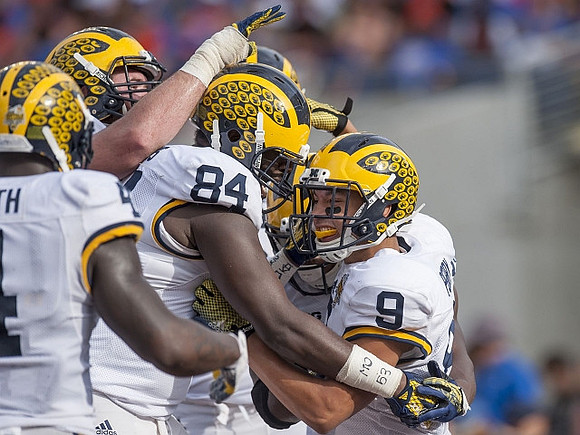 A.J. Williams (84) and Grant Perry (9)