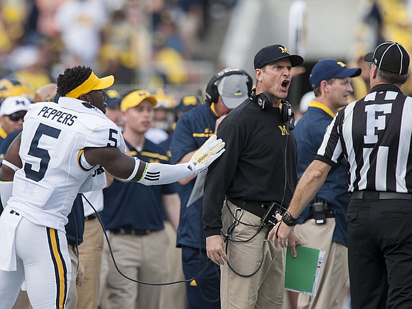 Jabrill Peppers (5) and Jim Harbaugh