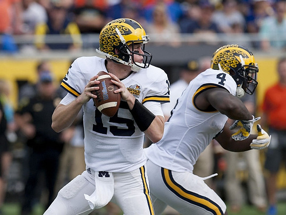 Jake Rudock (15) and De'Veon Smith (4)