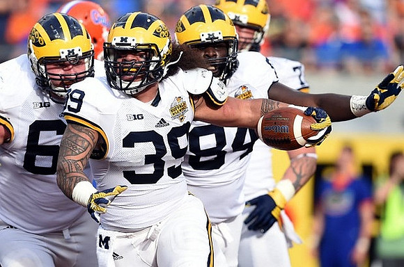 Kyle Kalis (67), Sione Houma (39), and A.J. Williams (84)