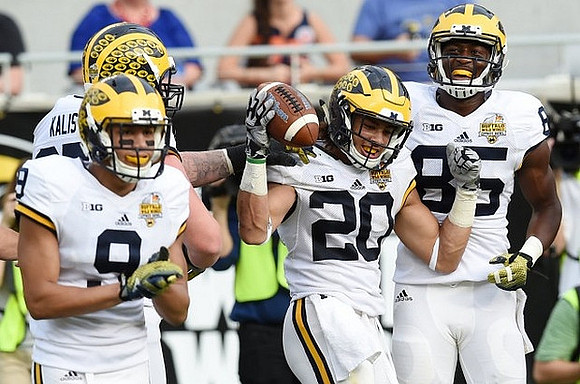 Grant Perry (9), Kyle Kalis (67), Drake Johnson (20), and Maurice Ways (85)