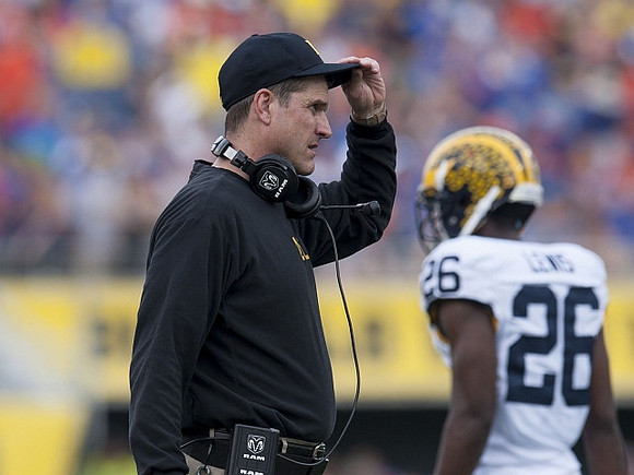 Jim Harbaugh and Jourdan Lewis (26)