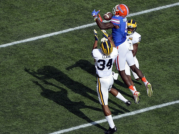 Jeremy Clark (34) and Dymonte Thomas (25)