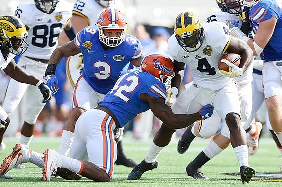 Jehu Chesson (86) and De'Veon Smith (4)