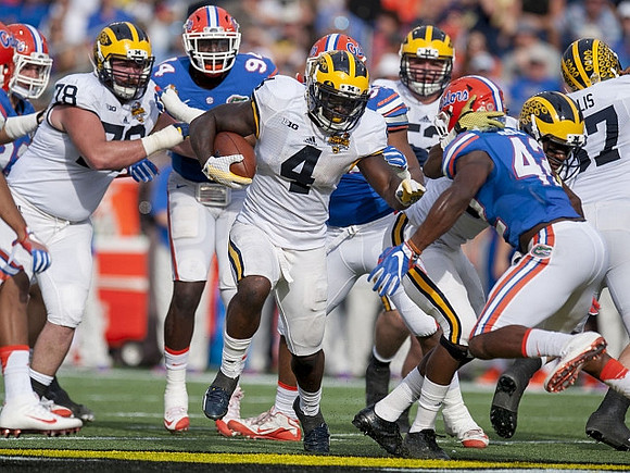 Erik Magnuson (78), De'Veon Smith (4), and Kyle Kalis (67)