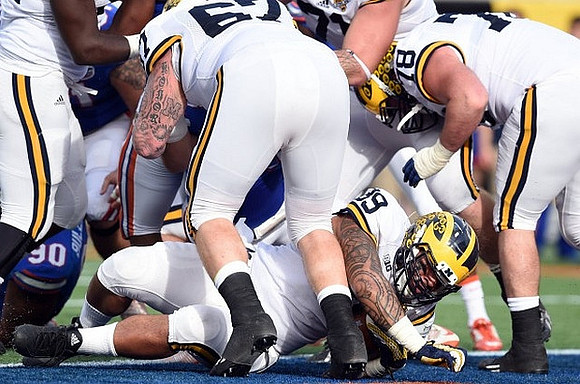 Kyle Kalis (67), Sione Houma (39), and Erik Magnuson (78)
