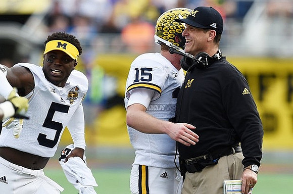 Jabrill Peppers (5), Jake Rudock (15), and Jim Harbaugh