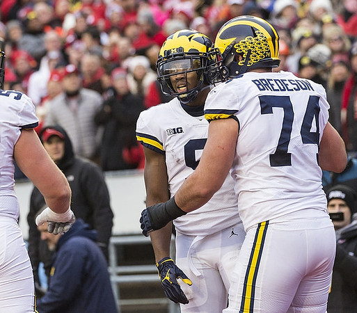 Donovan Peoples-Jones (9) and Ben Bredeson (74)