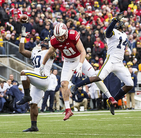 Devin Bush (10) and Josh Metellus (14)