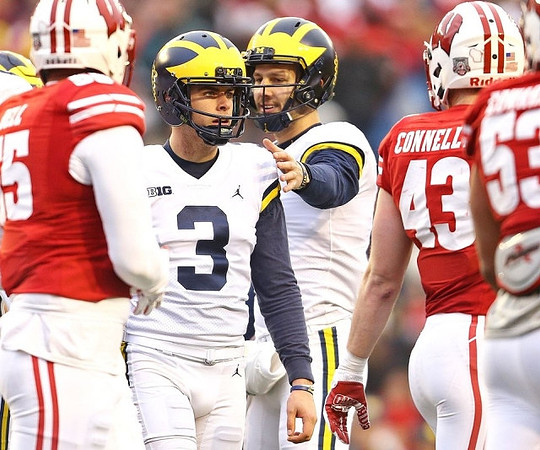 Quinn Nordin (3) and Garrett Moores (15)