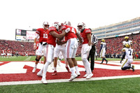 Josh Metellus (14) and Khaleke Hudson (7)