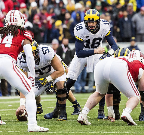 Patrick Kugler (57) and Brandon Peters (18)