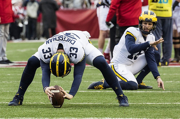 Camaron Cheeseman (33) and Garrett Moores (15)