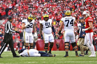 Brandon Peters (18), Mason Cole (52), Cesar Ruiz (51), and Ben Bredeson (74)