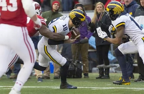 Brandon Peters (18) and Eddie McDoom (13)